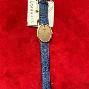 Choppard watch- Vintage (1980) White Gold/Lapis Azul numbers/alligator band.